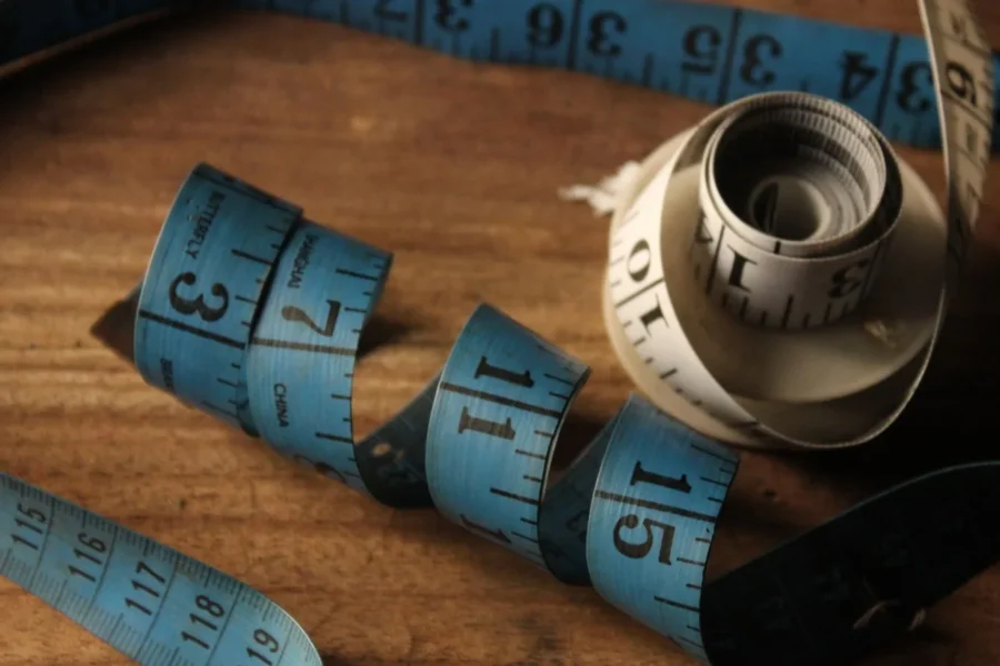 Jeans measuring tape fashion flat lay