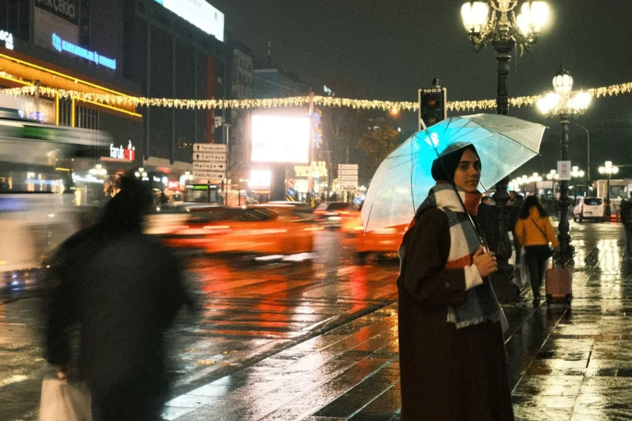 Woman coat rainy city