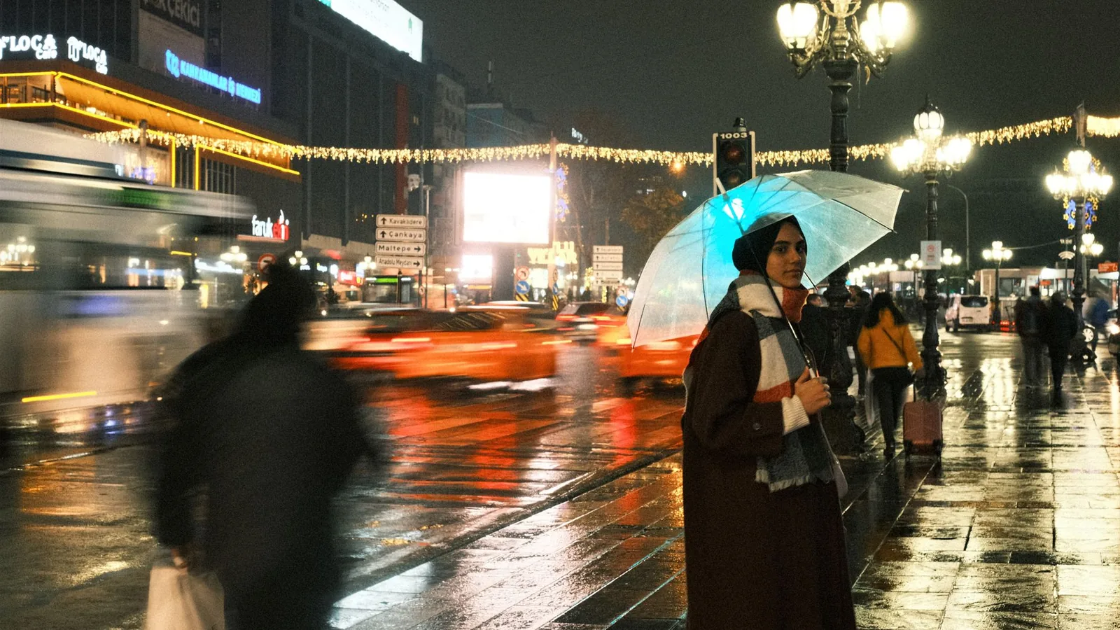Woman coat rainy city
