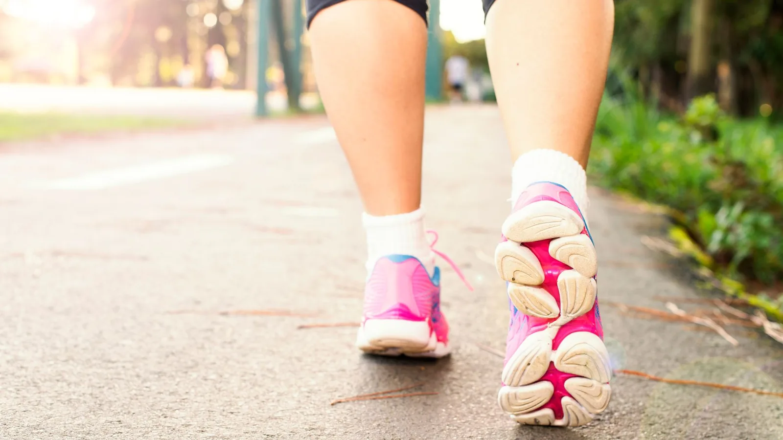 Woman trainers walking city