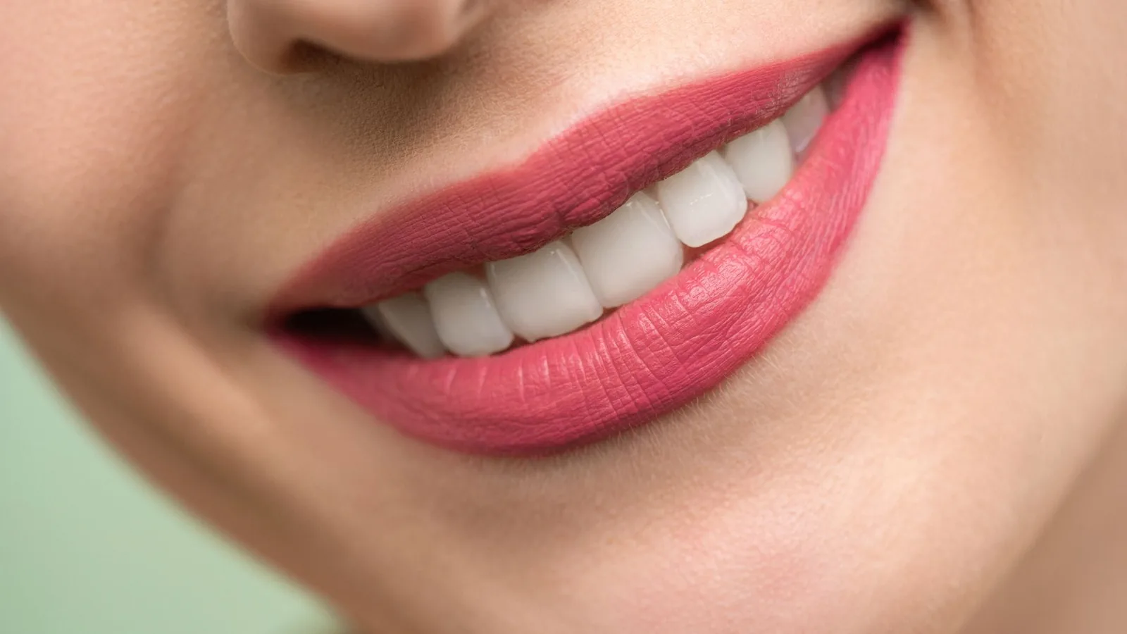 Smiling woman bright lipstick colourful