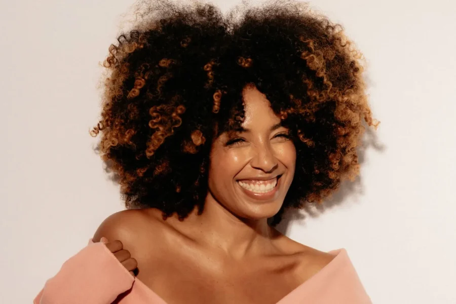 Happy woman curly hair beauty