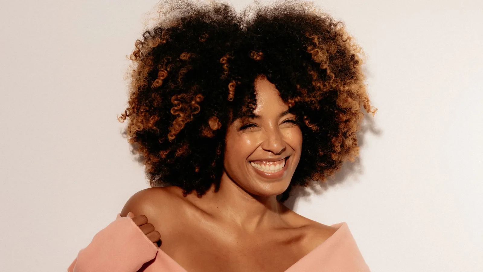 Happy woman curly hair beauty