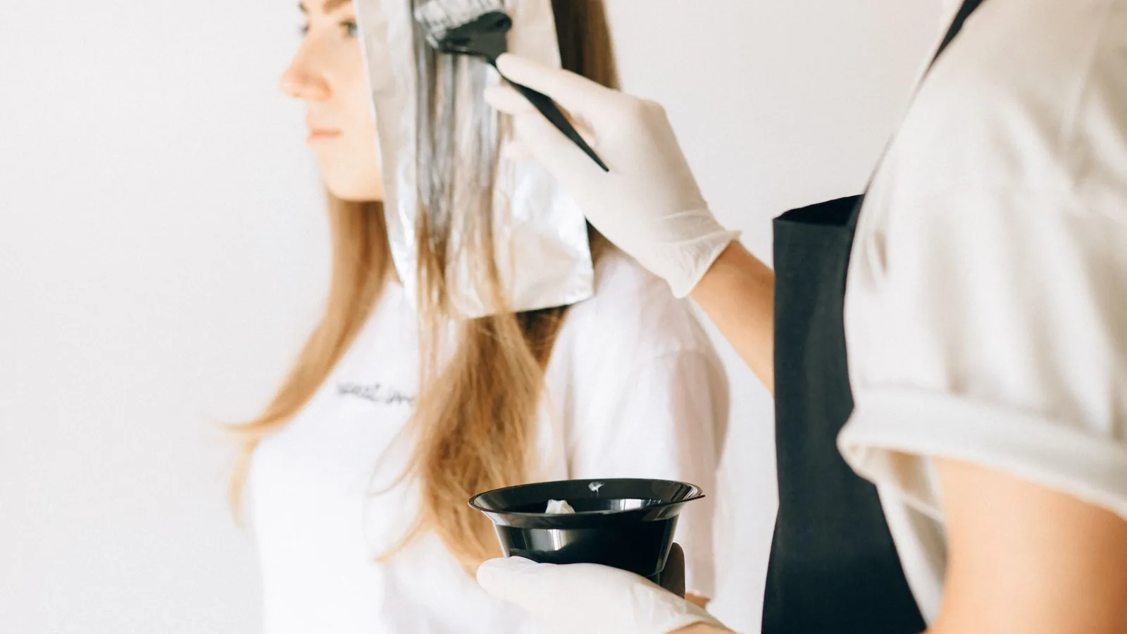 Woman choosing hair colour box beauty