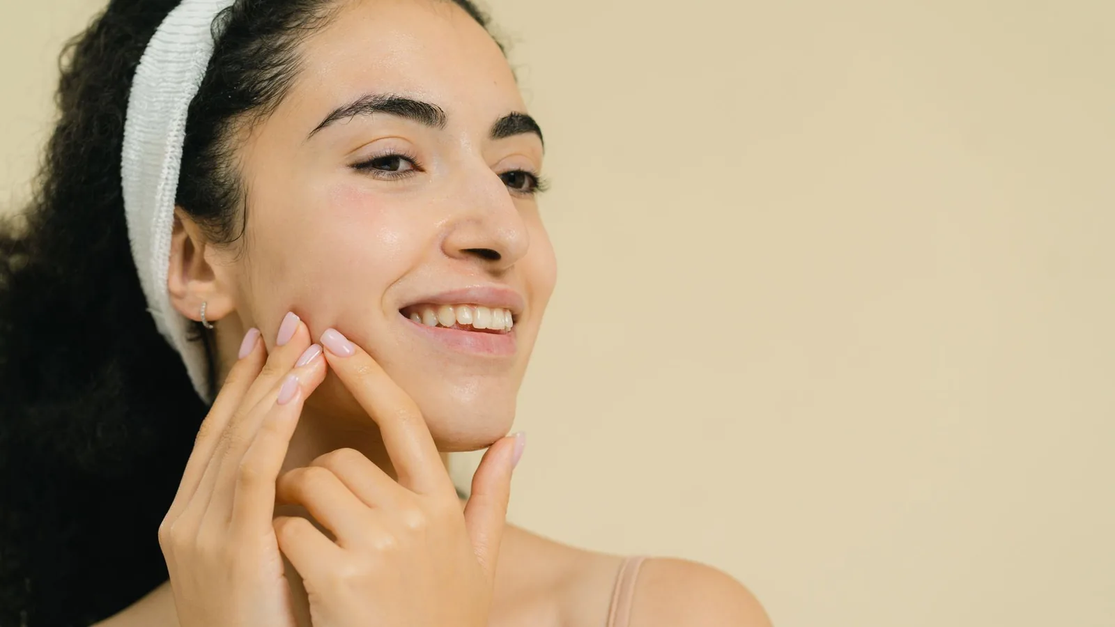 Joyful woman simple skincare colourful
