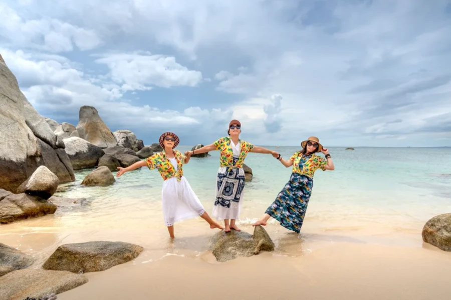 Joyful friends beach holiday