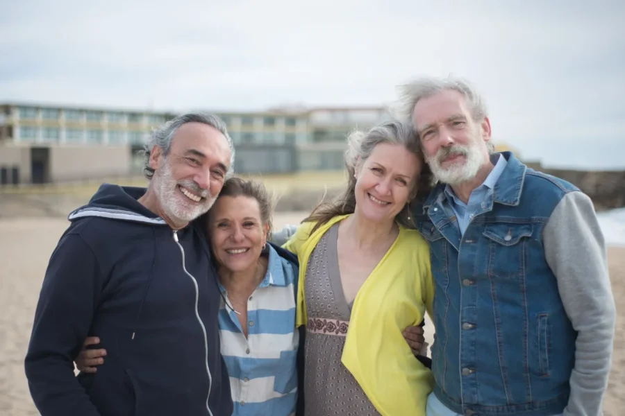 Happy friends seaside day trip