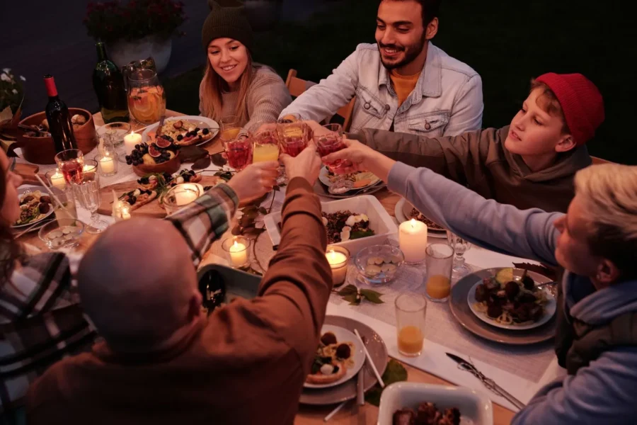 Joyful friends dinner table