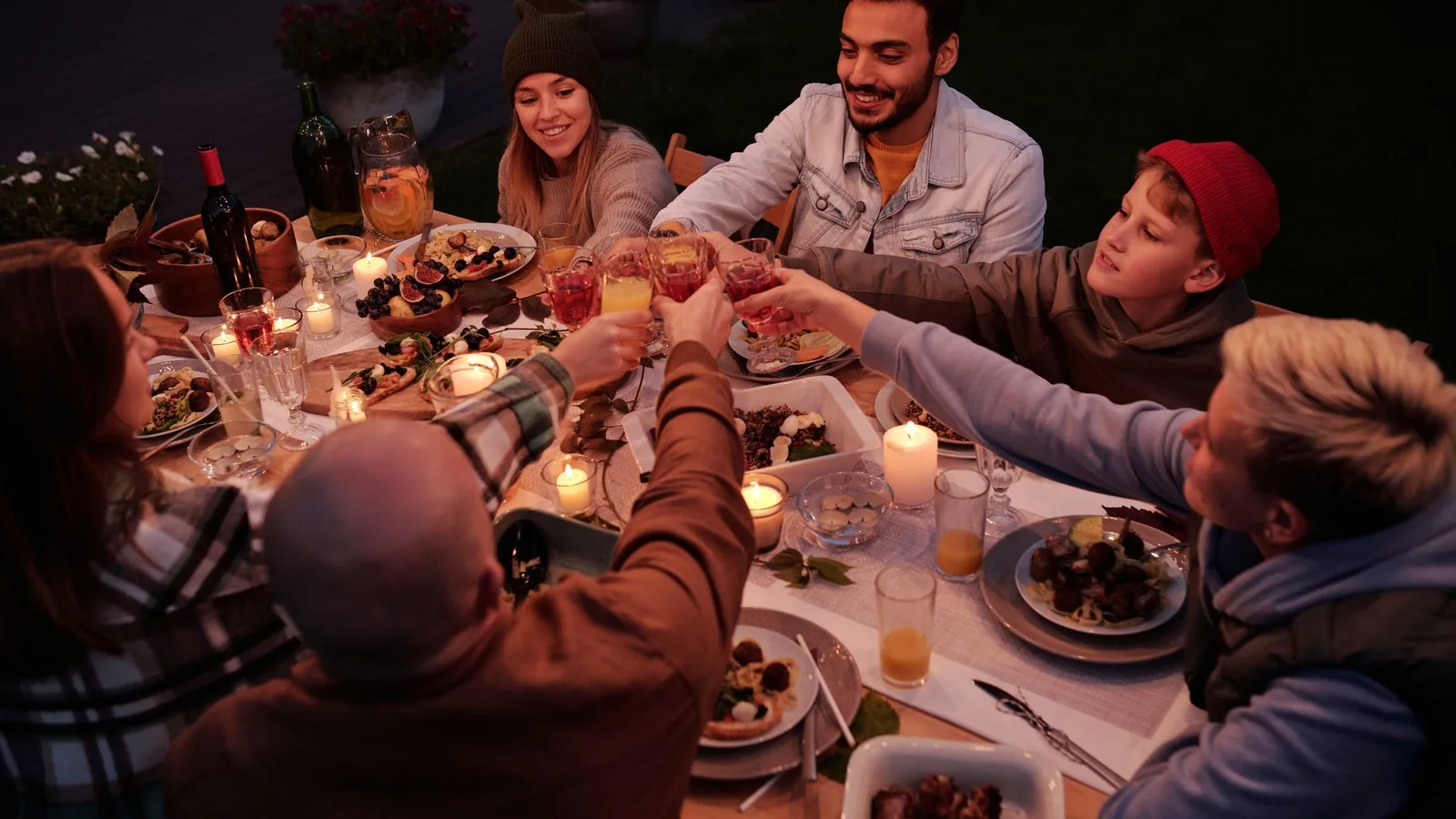 Joyful friends dinner table